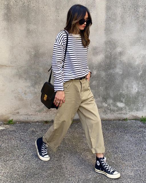 Striped shirts, khaki pants, and Converse sneakers for everyday wear