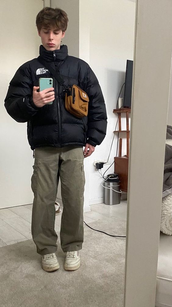 Wearing a puffer jacket with cargo pants is a great choice for winter days